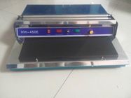 China supplie good quality HW-450 Meat Fruit Hand packaging Wrapper Machine
